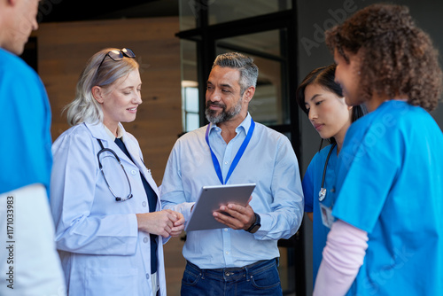 Multiethnic healthcare team meeting pharmaceutical representative