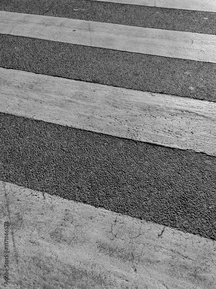 Fototapeta premium Detail of a road with asphalt and pedestrian crossing