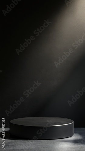 Minimalist display platform in low light creating a dramatic artistic setting for product presentation or photography in a studio environment