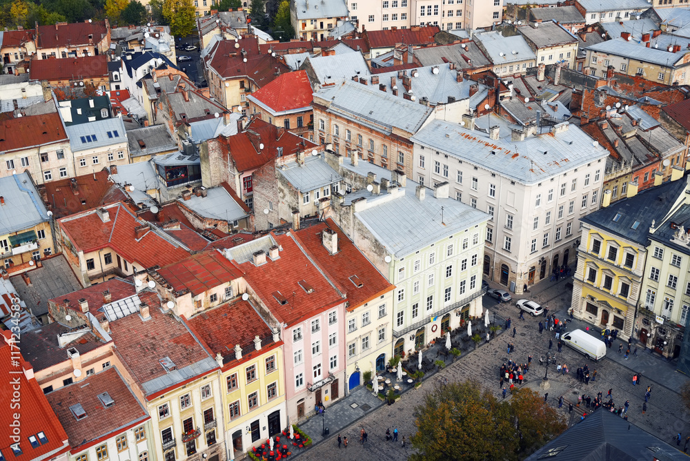 Fototapeta premium Landmark market square on downtown district aerial view of old centre of Europian buildings rooftop in Lviv, Ukraine.