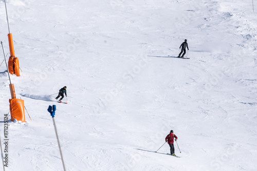 Obraz na płótnie Skiers on the ski slopes in Andorra at Grandvalira in January 2025. w salonie