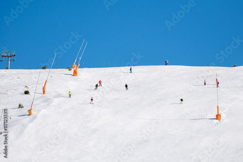 Obraz na płótnie Skiers on the ski slopes in Andorra at Grandvalira in January 2025. w salonie