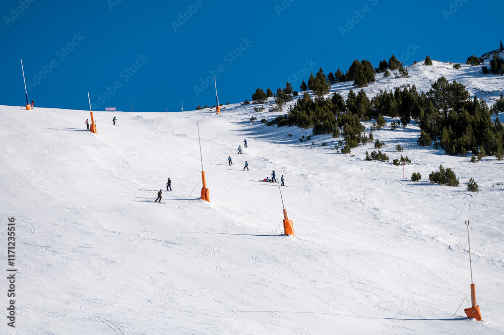 Skiers on the ski slopes in Andorra at Grandvalira in January 2025.
