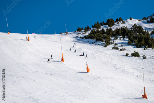 Obraz na płótnie Skiers on the ski slopes in Andorra at Grandvalira in January 2025. w salonie
