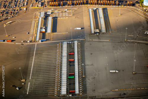Photos aerial of trucks in a port side marshalling yard