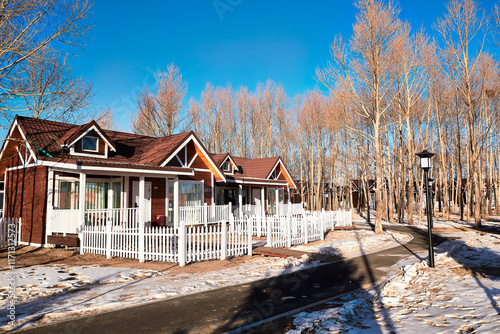 Foto Wooden villa complex in Kulun Nao Scenic Area, Zhangjiakou, Hebei, China