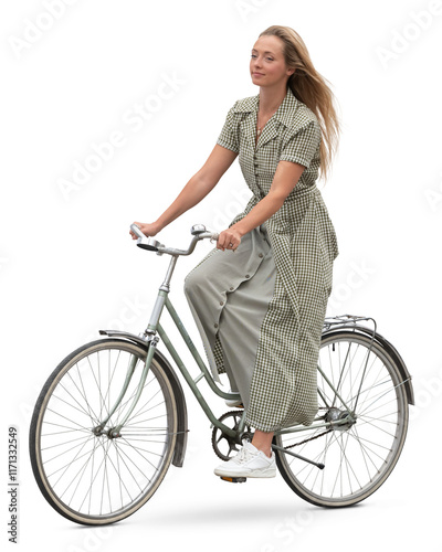Young woman in a dress riding a bike with her long hair blowing in the wind isolated on transparent background