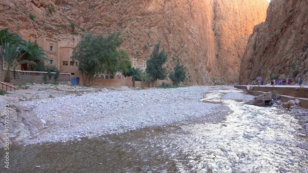 Africa, Tinghir, Morocco, Todra Gorge of Atlas mountains, People tourists walking between rocky high walls of the canyon ,
Todra and Dades Valley tourist destination sightseeing attraction