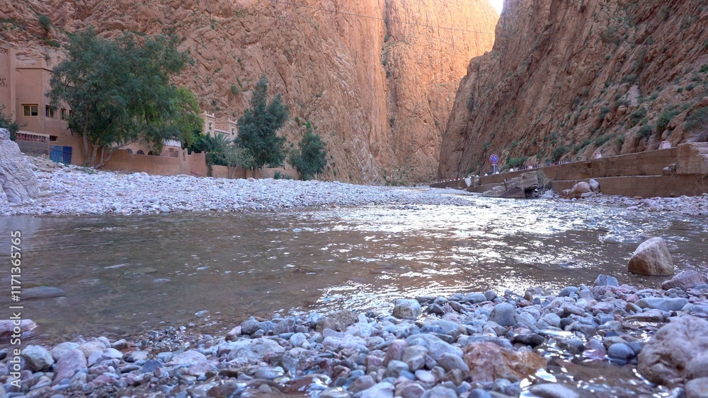 Africa, Tinghir, Morocco, Todra Gorge of Atlas mountains, People tourists walking between rocky high walls of the canyon ,
Todra and Dades Valley tourist destination sightseeing attraction
