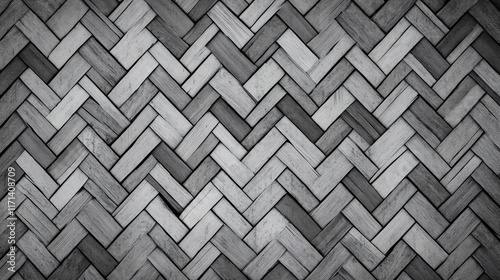 Elegant herringbone pattern of wooden flooring in grayscale tones for interior design. photo