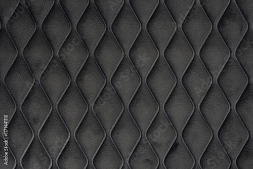 Classic black quilted velour background for upholstery of elegant vintage luxury sofa. Soft interior background.