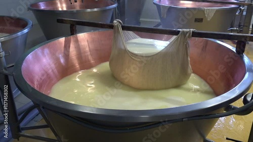 Production of a form of Parmesan cheese - Parmigiano Reggiano - in a dairy in the province of Reggio Emilia, Italy