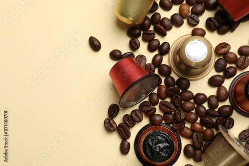 Wallpaper Mural Coffee capsules and beans on beige background, flat lay. Space for text Torontodigital.ca