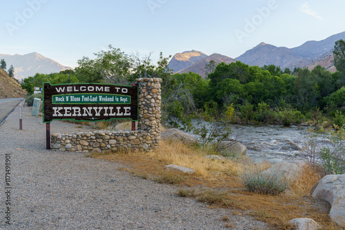 Welcome to Kernville California sign by Kern River with mountains