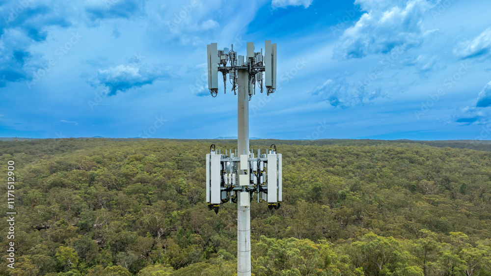 Drone aerial photograph of the top section of a telecommunications tower equipped with antennas and transmission equipment used for communications in regional New South Wales, Australia. Drone aerial photograph of the top section of a telecommunications tower equipped with antennas and transmission equipment used for communications in regional New South Wales, Australia.