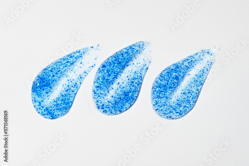 Exfoliating Face Scrub Smears with Blue Particles Texture