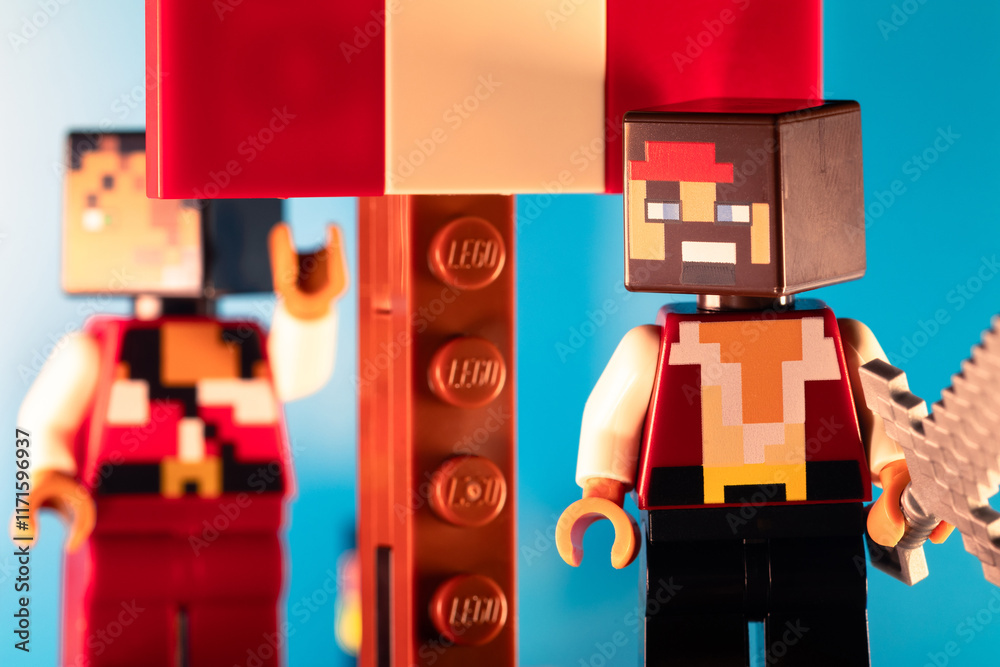Fototapeta premium LEGO Minecraft Pirates closeup on a pirate ship against a blue sky