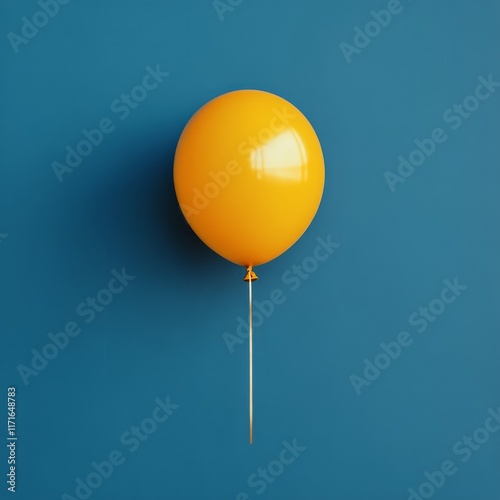 Bright yellow balloon floats against a vibrant blue background creating a che...