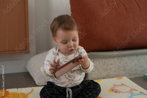 10 month-old baby using phone