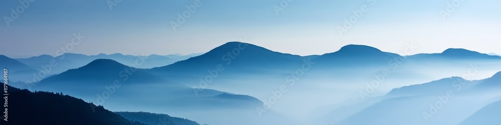 Serene mountain landscape shrouded in mist, evoking tranquility and natural beauty. Serene mountain landscape shrouded in mist, evoking tranquility and natural beauty.