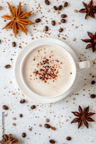 Delicious coffee with spices presented on a white background