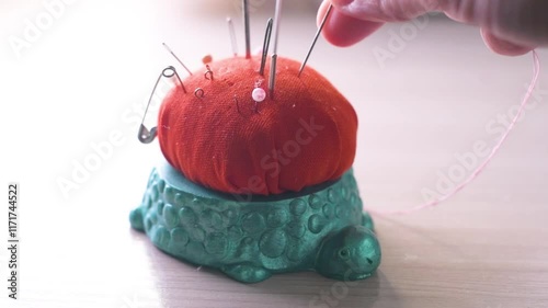 using a tortoise-shaped needler
