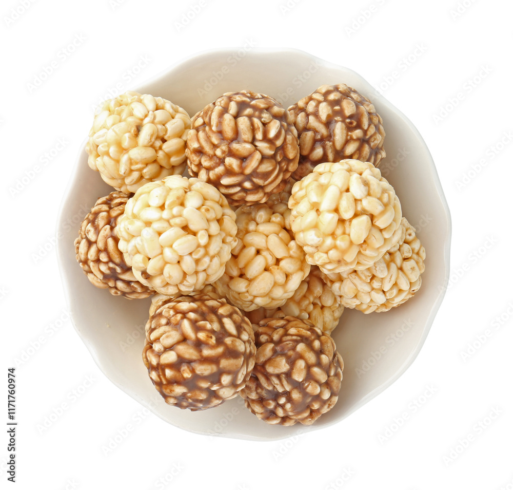 Tasty puffed rice balls in bowl isolated on white, top view Tasty puffed rice balls in bowl isolated on white, top view
