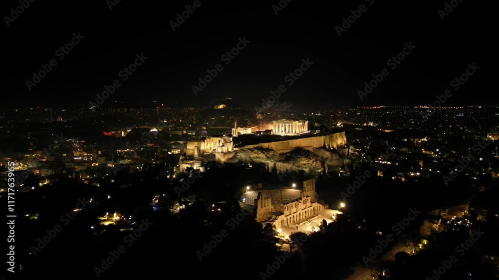 Aerial video over the Acropolis in Athens at night welcoming the year 2025