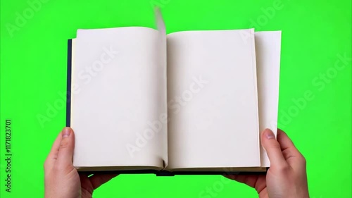 book turn page animation with realistic flipping pages on the green screen background
