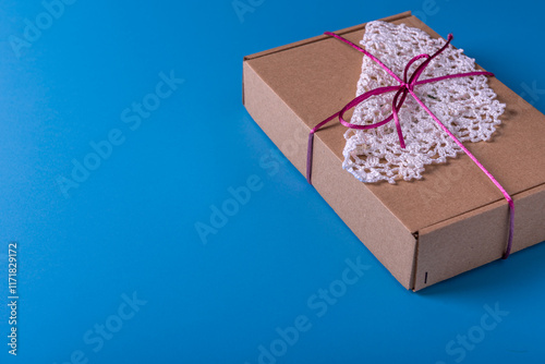 Present box, decoration of gift on table, top view with copy space photo