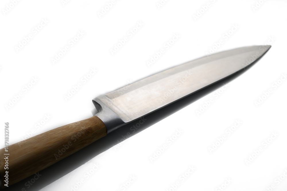 Sharp kitchen knife resting on a clean surface with a wooden handle showcasing craftsmanship and design Sharp kitchen knife resting on a clean surface with a wooden handle showcasing craftsmanship and design