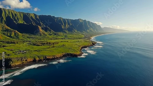 Majestic coastline and lush mountainscape along the Oahu shoreline during a clear day
