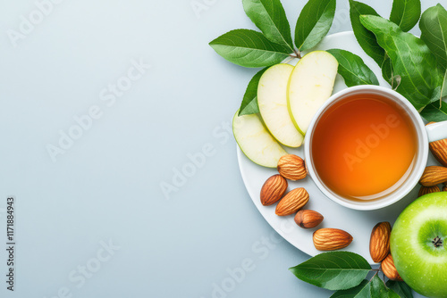 Wallpaper Mural Fresh tea with apple slices and almonds on plate Torontodigital.ca