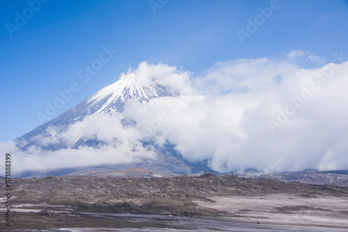 Therer is Kluchevskaya sopka on the bacground. It is the highest active volcano in Eurasia. photo