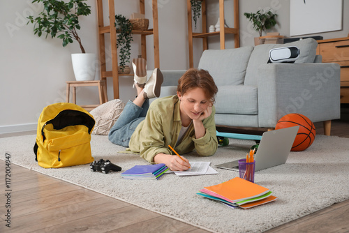 Male student studying on ca...