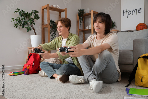 Male students playing video...