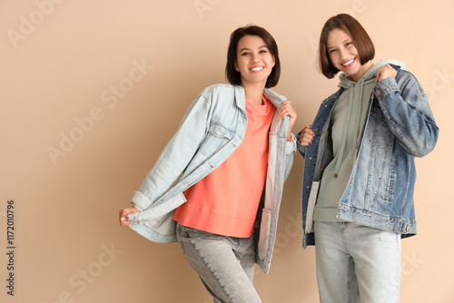 Two happy young women in st...