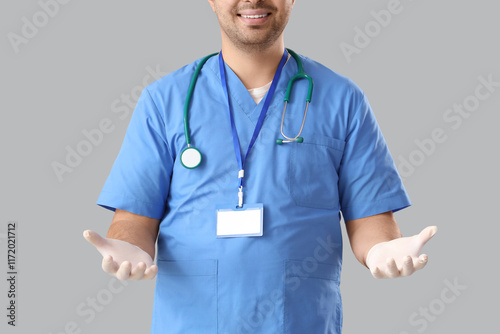 Male doctor in rubber glove...