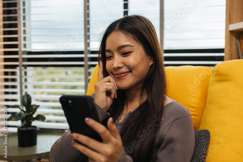 smiling young woman at home using modern smartphone, online chat, beautiful woman relaxing at home listening music and other things that she likes, pensive multiracial woman relaxing at home, Free Download smiling young woman at home using modern smartphone, online chat, beautiful woman relaxing at home listening music and other things that she likes, pensive multiracial woman relaxing at home, - GFXLoad