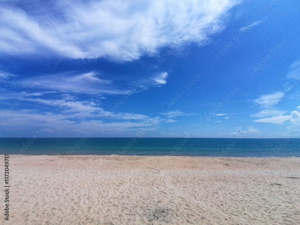 Beautiful beach at terengganu Malaysia , clouds and blue sky Beautiful beach at terengganu Malaysia , clouds and blue sky