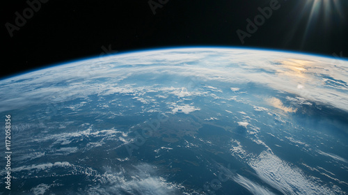 Fototapeta Naklejka Na Ścianę i Meble -  Stunning sunrise view of Earth from space, showcasing the curvature of the planet and the atmosphere.