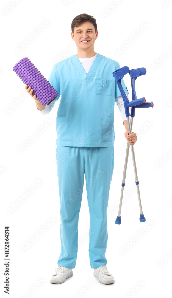 Male physiotherapist with foam roller and crutches on white background Male physiotherapist with foam roller and crutches on white background