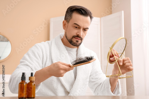Handsome man with brush and...
