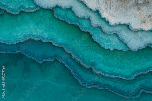 Abstract teal and blue layered agate texture.