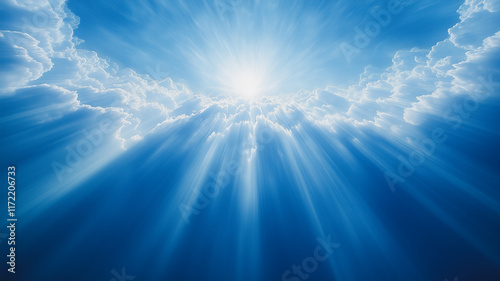 Fototapeta Naklejka Na Ścianę i Meble -  Celestial Light: A breathtaking view of the sun shining through clouds, casting ethereal rays of light down to the earth. The blue sky and fluffy clouds create a serene and inspiring atmosphere.