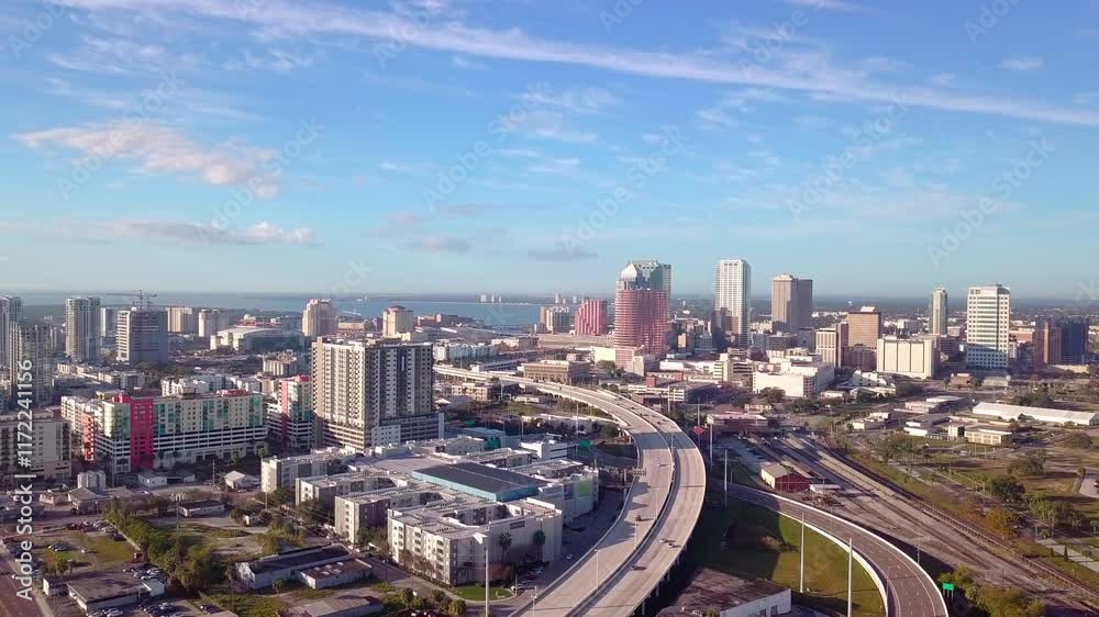Aerial static shot of traffic moving in and out of downtown Tampa, Florida.