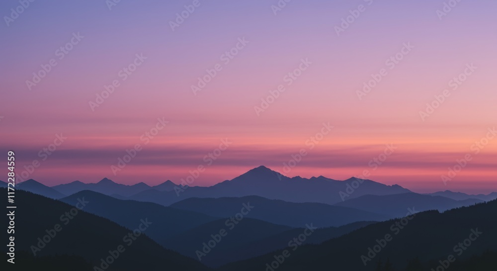 Fototapeta premium Dramatic Sunset Over Distant Mountains