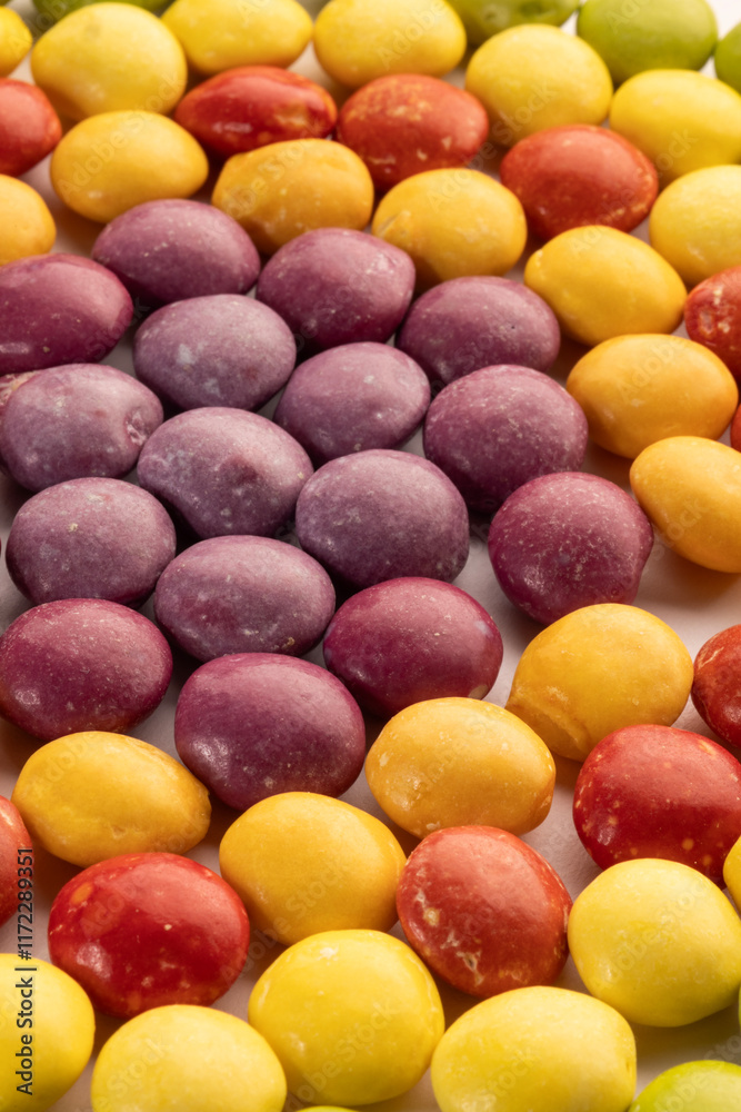 Dye-free natural candy with no artificial ingredients isolated on a white background in groups based on the color, healthier alternative, good option for ADHD children Dye-free natural candy with no artificial ingredients isolated on a white background in groups based on the color, healthier alternative, good option for ADHD children