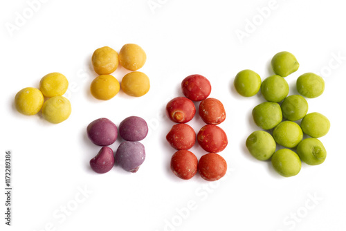 Dye-free natural candy with no artificial ingredients isolated on a white background in groups based on the color, healthier alternative, good option for ADHD children