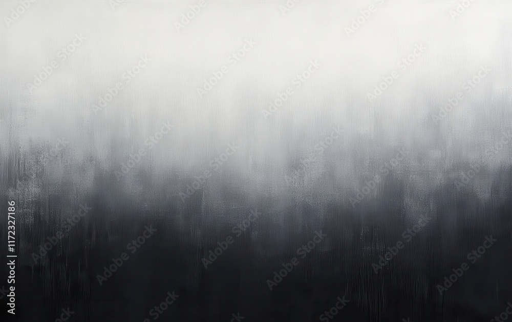 Fototapeta premium A highly detailed monochrome background where the gradient subtly moves from a dark charcoal gray at the top, fading into a much lighter, almost silver shade at the bottom. 